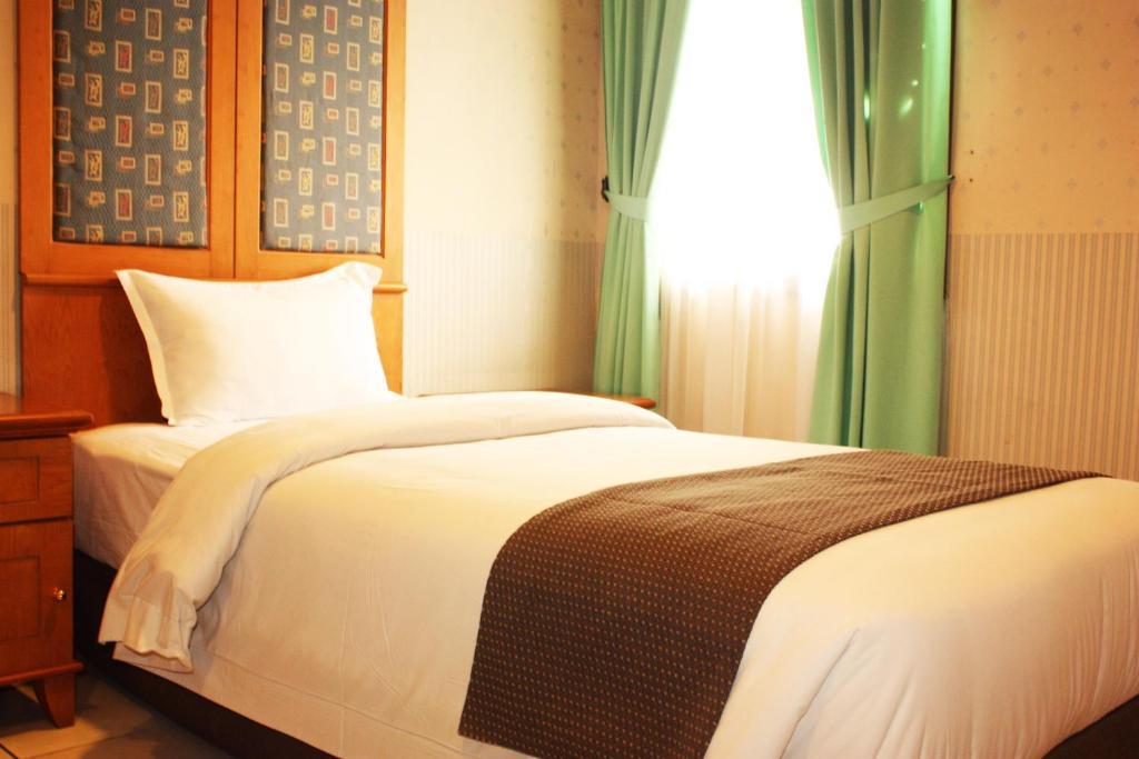 Travellers Suites Serviced Apartments Medan Zimmer foto