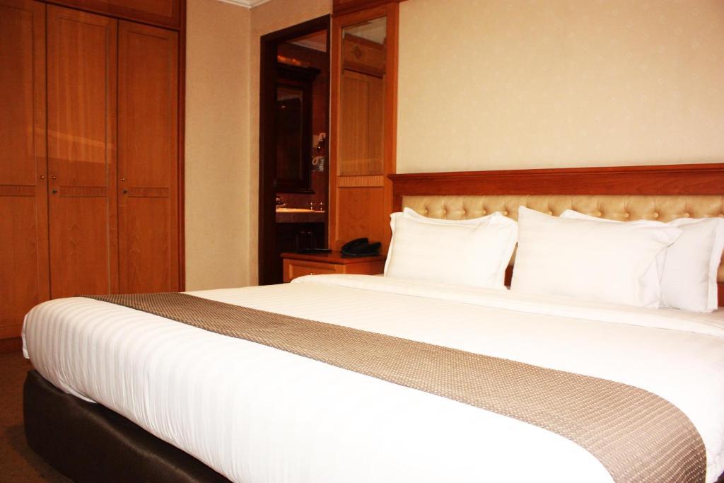 Travellers Suites Serviced Apartments Medan Zimmer foto